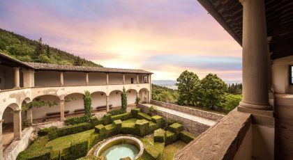 Renovated convent villa near Florence with an arched cloister courtyard and garden, linking to Overseas Properties
